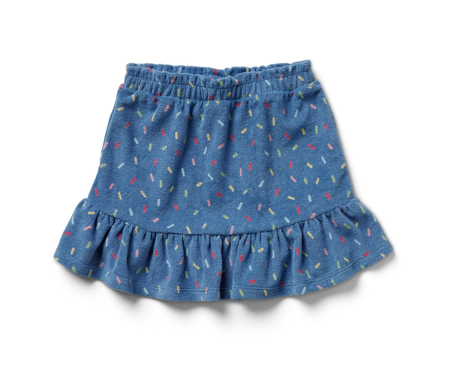 Niebieska spódnica z tkaniny frotté z kolorowym wzorem.