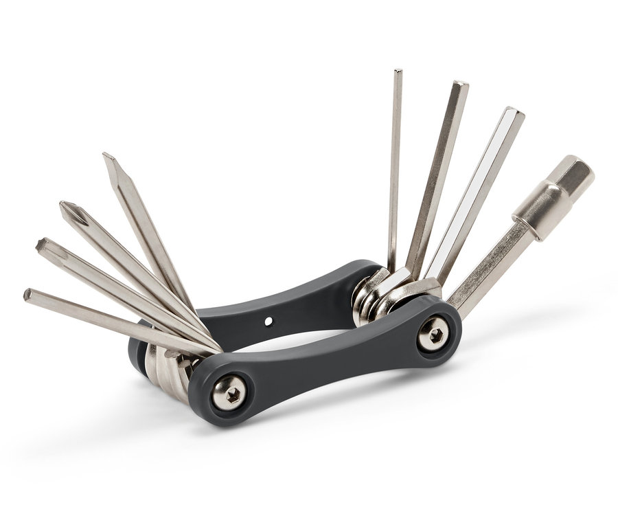 Szary, wielofunkcyjny zestaw narzędzi z różnymi, srebrnymi końcówkami.