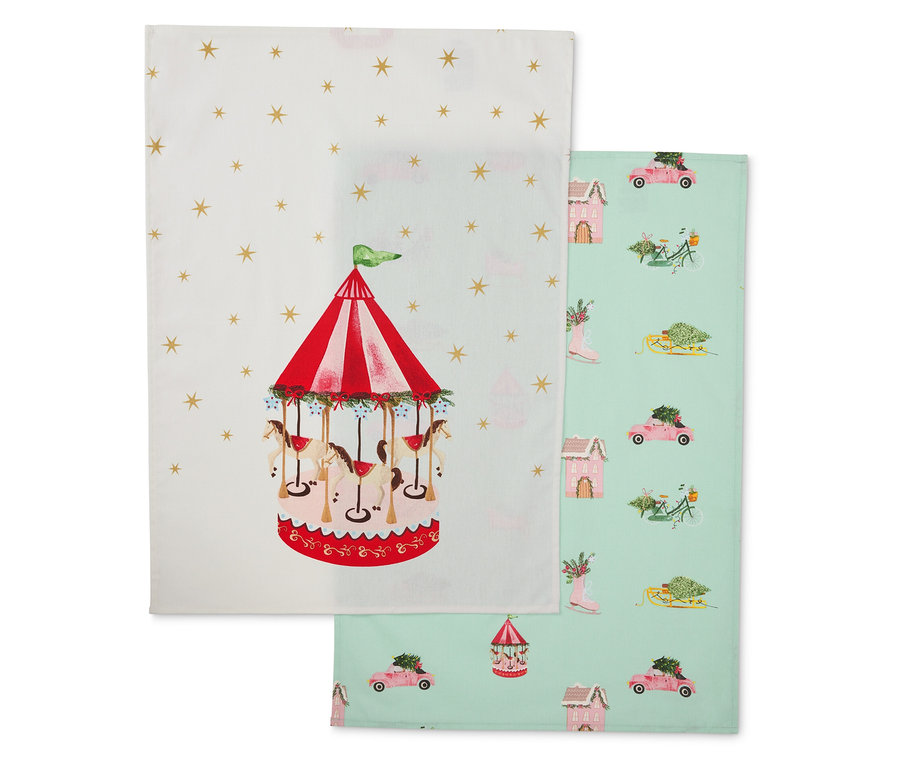 Dwie ściereczki materiałowe: jedna z karuzelą, druga z motywami zimowymi.