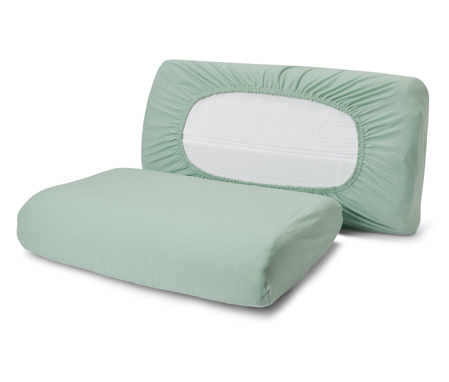 Dwie zielone poszewki jersey na poduszkę pod szyję.