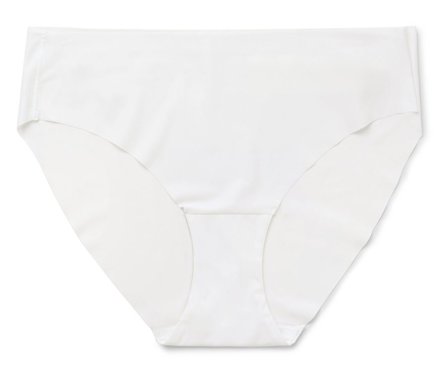 Biała damska bielizna leży na białym tle.