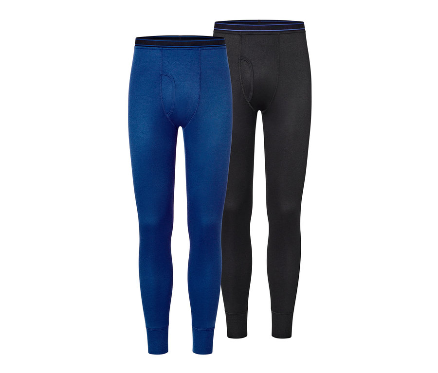Dwie pary termoaktywnych kalesonów funkcyjnych: niebieskie i czarne.