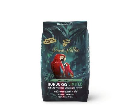Ciemnozielone opakowanie kawy Privat Kaffee Limited Edition Honduras z tropikalnym wzorem i dwoma czerwonymi arami.