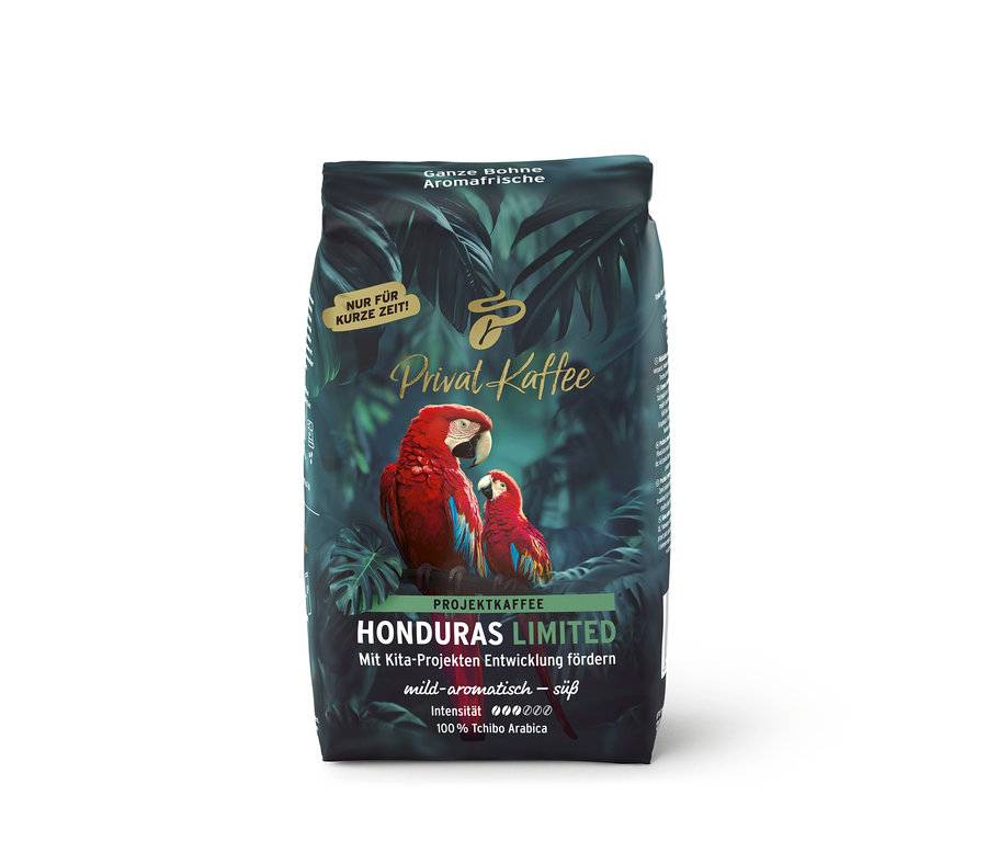 Ciemnozielone opakowanie kawy Privat Kaffee Limited Edition Honduras z tropikalnym wzorem i dwoma czerwonymi arami.