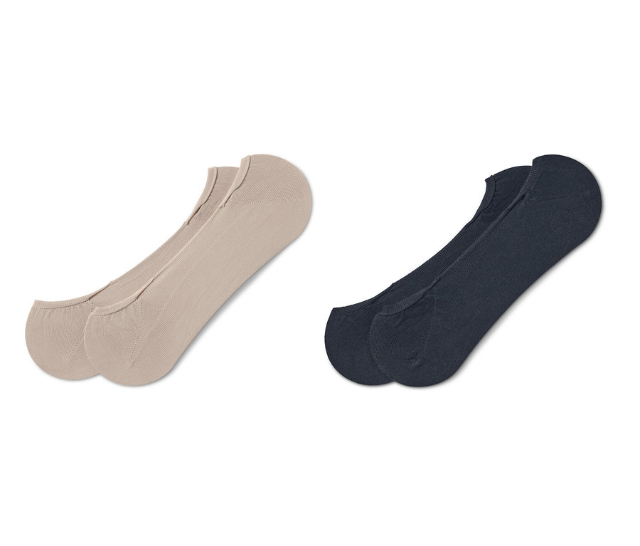 Dwie pary stopek: jedna para beżowa, druga granatowa.