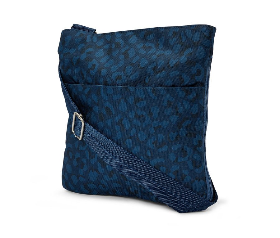 Niebieska antykradzieżowa torba na ramię z ciemnoniebieskim zwierzęcym wzorem.