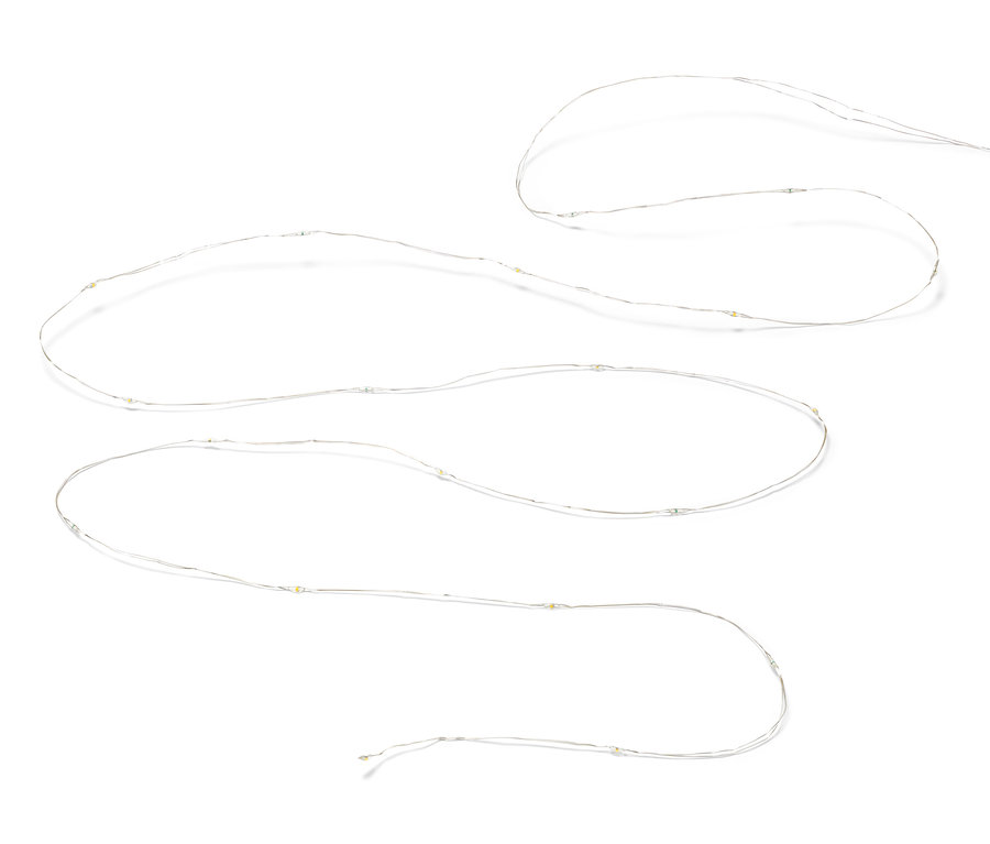 Łańcuch świetlny z mikrodiodami LED, krople, na białym tle.