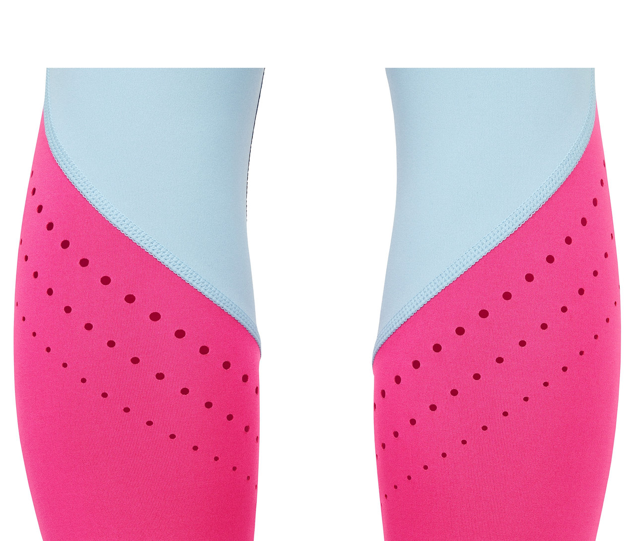 Zbliżenie na legginsy sportowe o długości 7/8 w kolorze różowym i jasnoniebieskim.