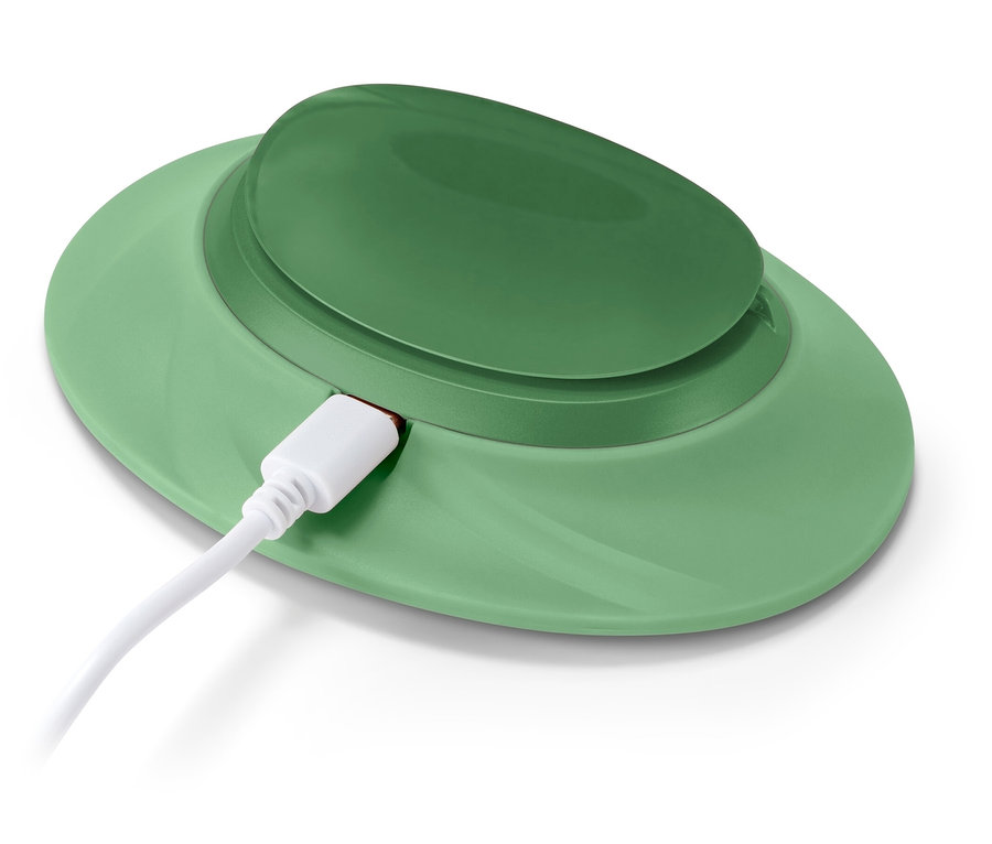 Zielona ładowarka bezprzewodowa z podłączonym białym kablem USB-C.