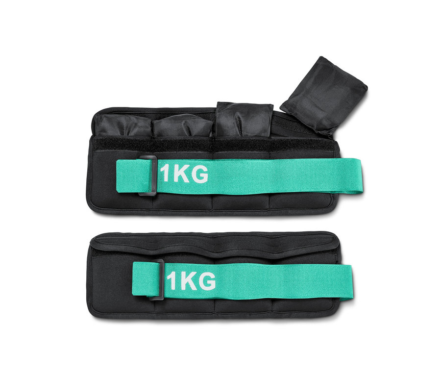 Dwa czarne ciężarki na nadgarstki z turkusowymi paskami i napisem 1 kg.