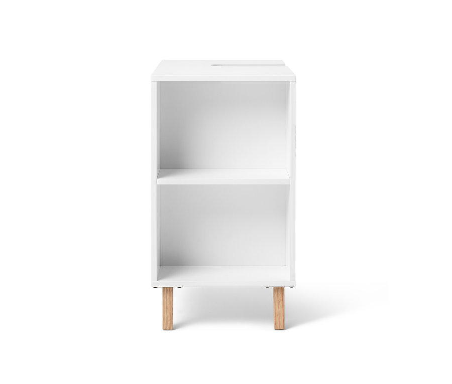 Biała szafka pod umywalkę z boczną przegródką.