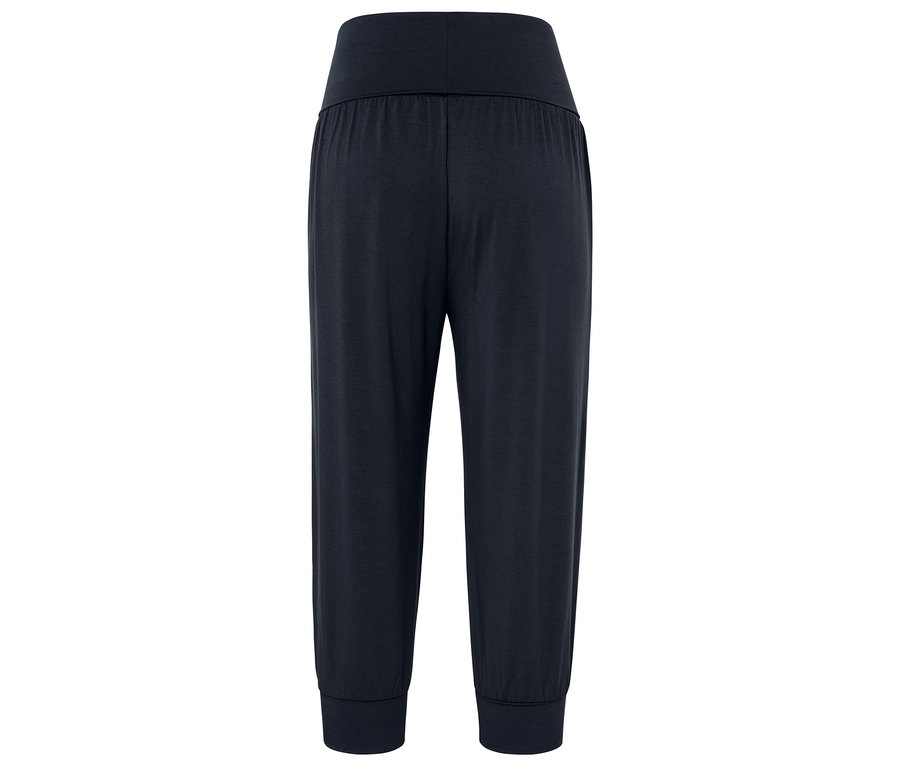 Granatowe spodnie haremki z wysokim stanem.