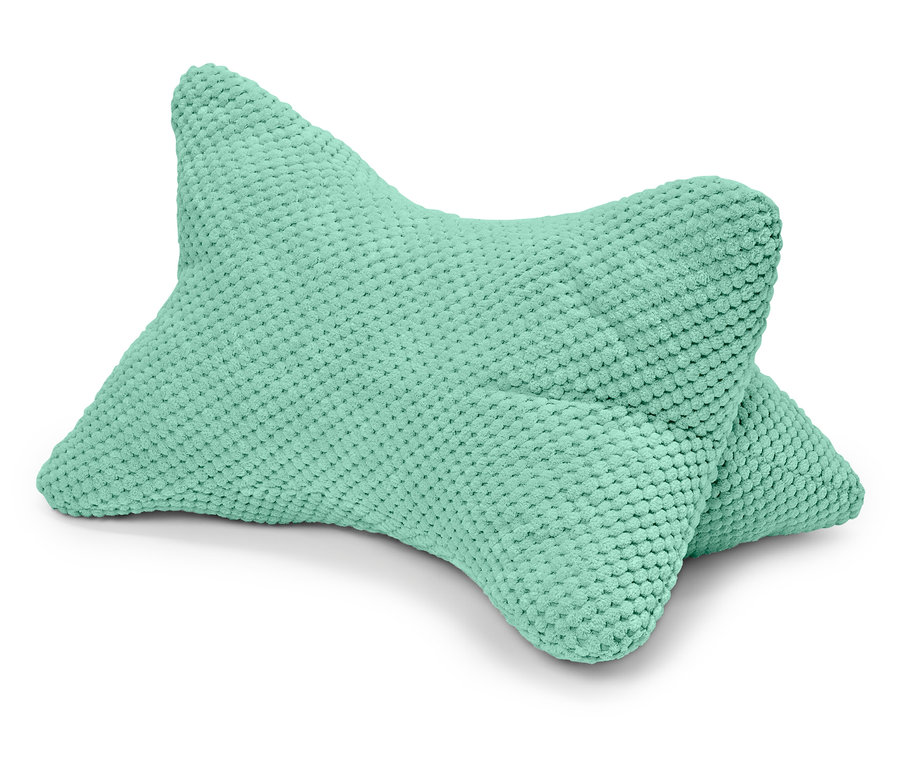 Miętowa poduszka do czytania leży na białym tle.