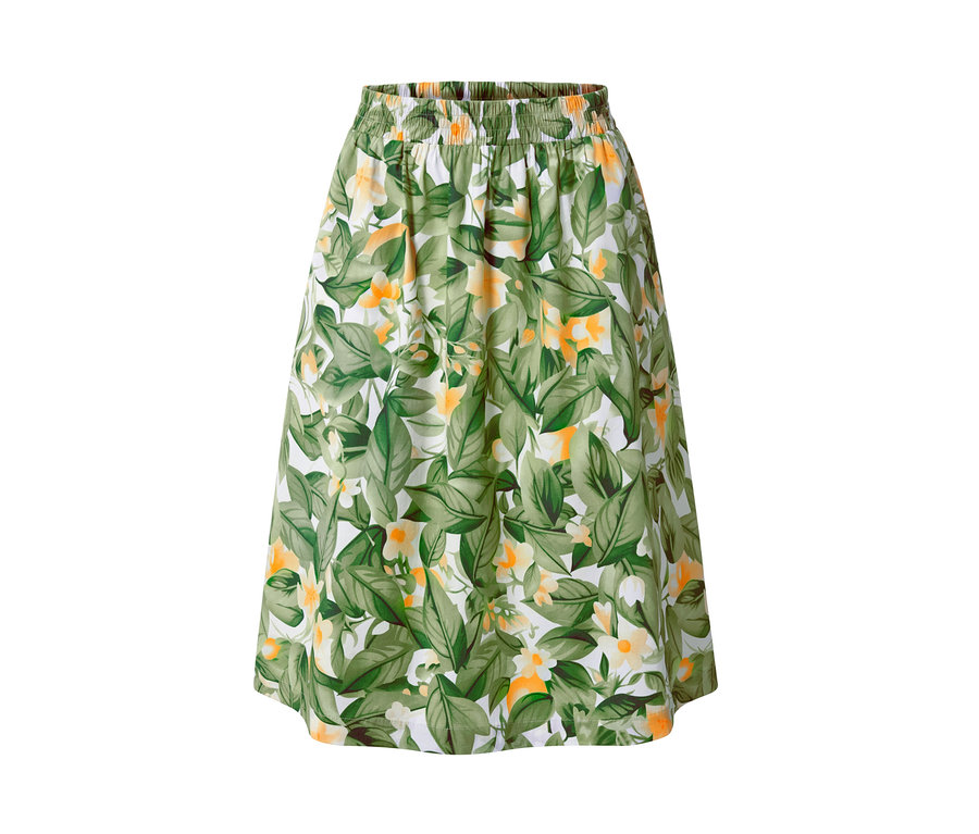 Wzorzysta spódnica z popeliny z zielonymi liśćmi i żółtymi kwiatami na białym tle.