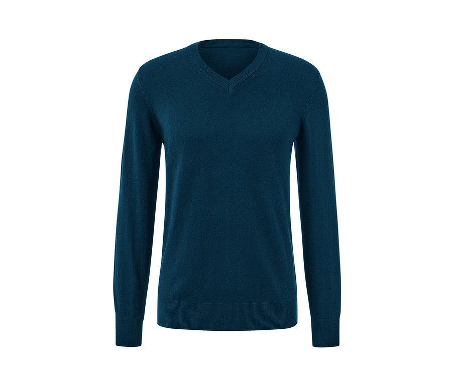 Ciemnoturkusowy sweter z dekoltem w serek.