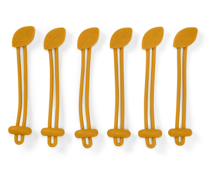 Sześć żółtych silikonowych uchwytów z wzorem liścia na górze i zapięciem w kształcie litery U na dole na białym tle.