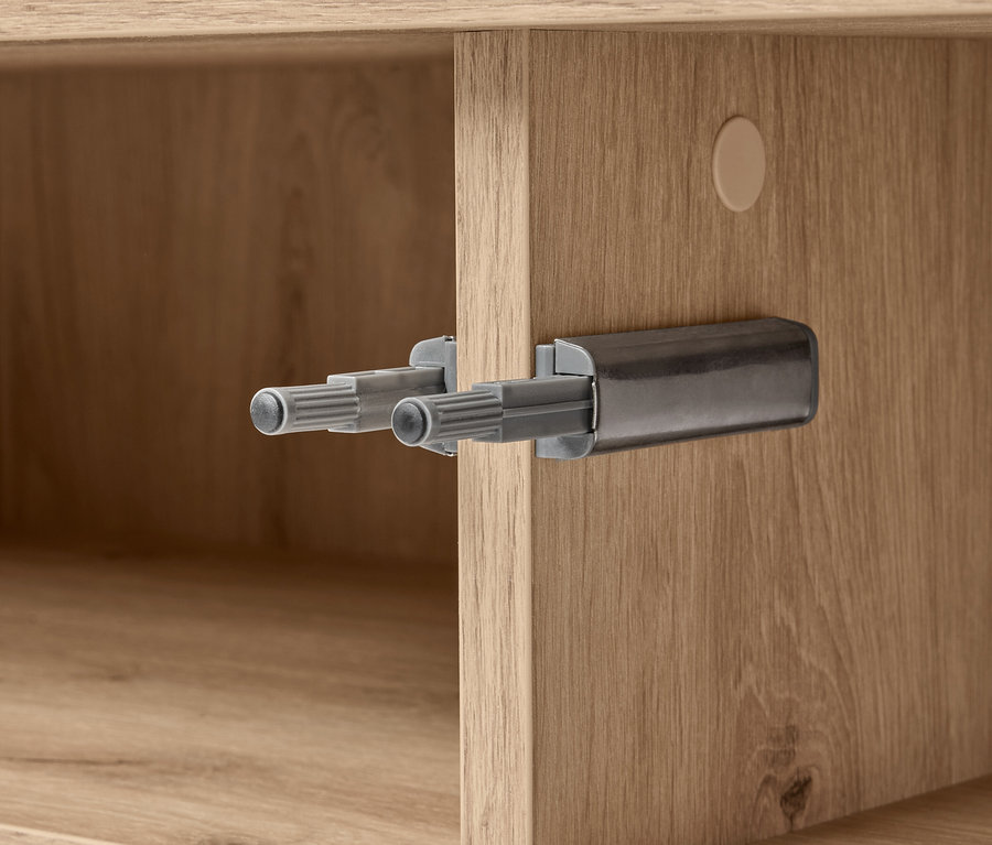 Szczegół kredensu REET z bliska pokazujący mechanizm.