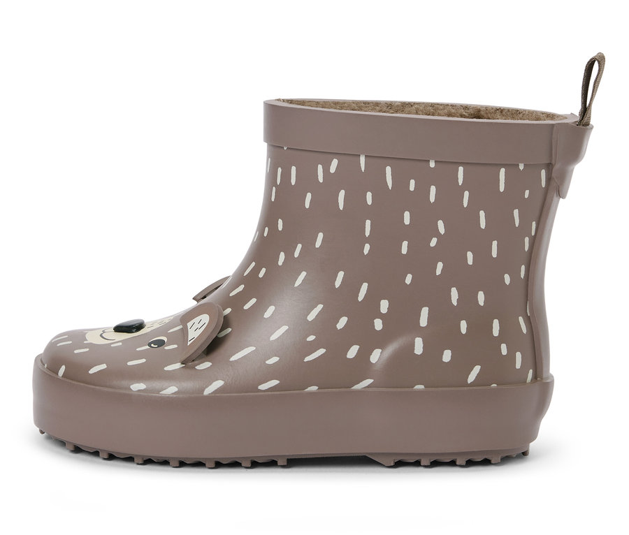 Brązowy kalosz dziecięcy z białymi kropkami i twarzą misia.