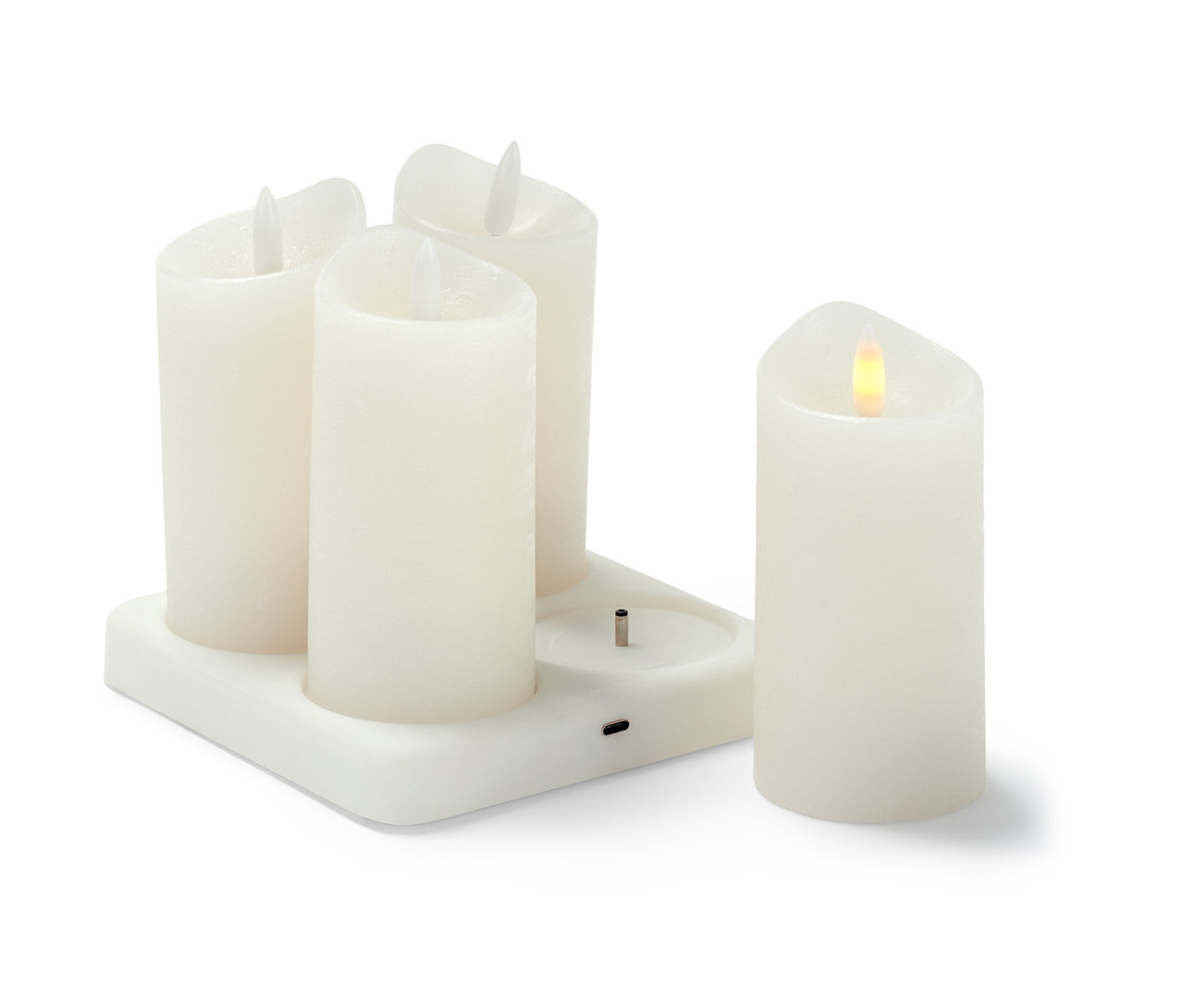 Cztery świece LED z prawdziwego wosku z akumulatorem i stacją ładującą.