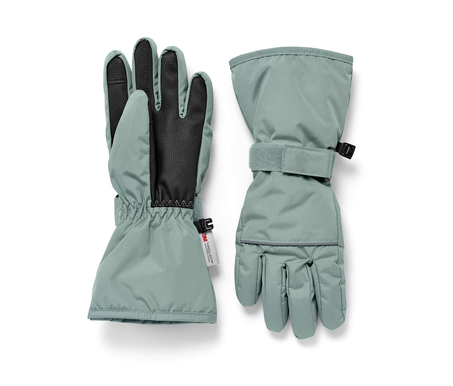 Zielone dziecięce rękawiczki narciarsko-zimowe.