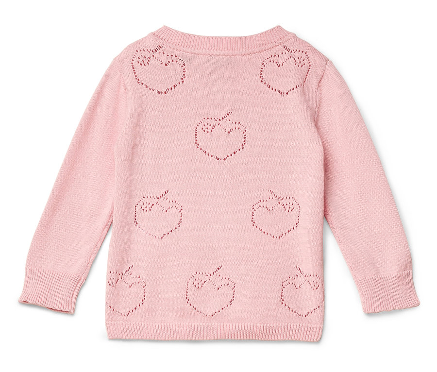 Różowy sweter z dziurkowanym wzorem w kształcie jabłek.