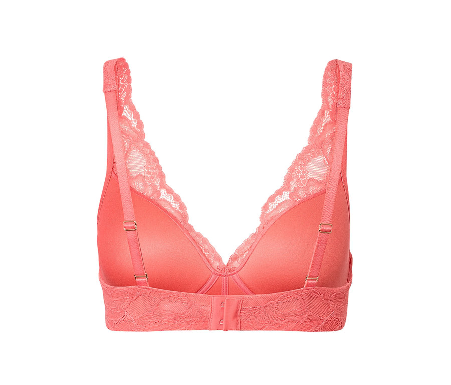 Zbliżenie tyłu biustonosza z miękkimi miseczkami w kolorze papai z koronkowymi detalami.