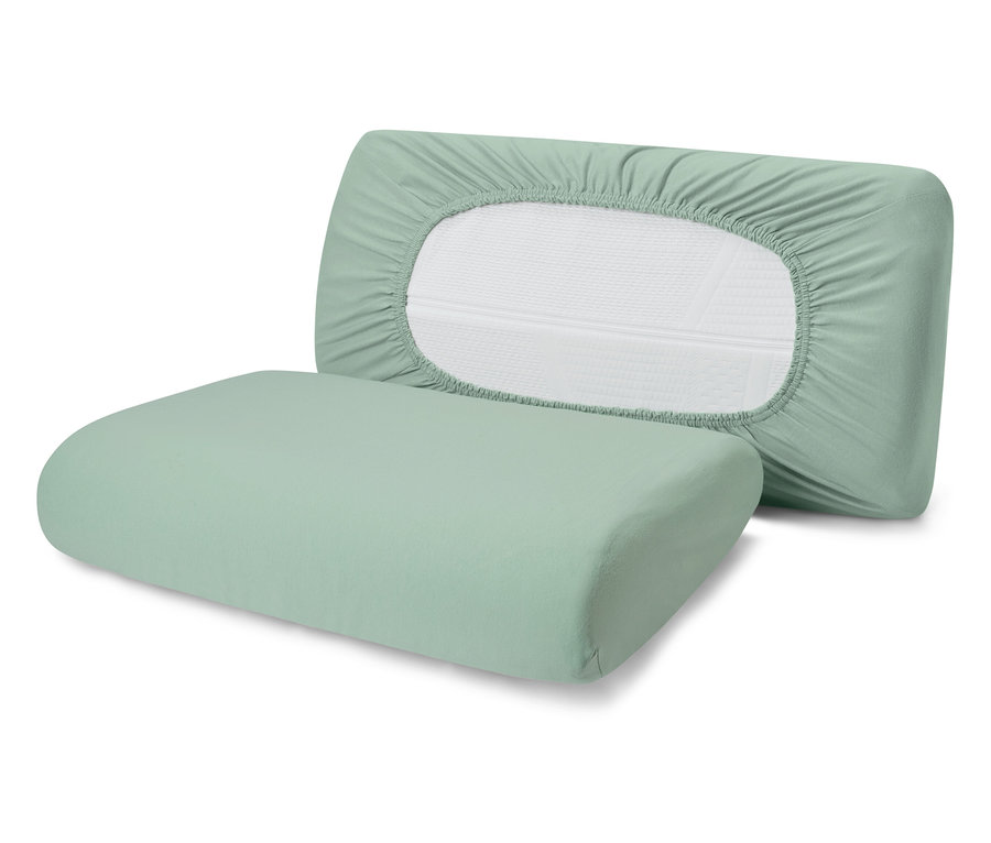 Dwie jasnozielone poszewki na poduszki, jedna z elastycznym brzegiem.