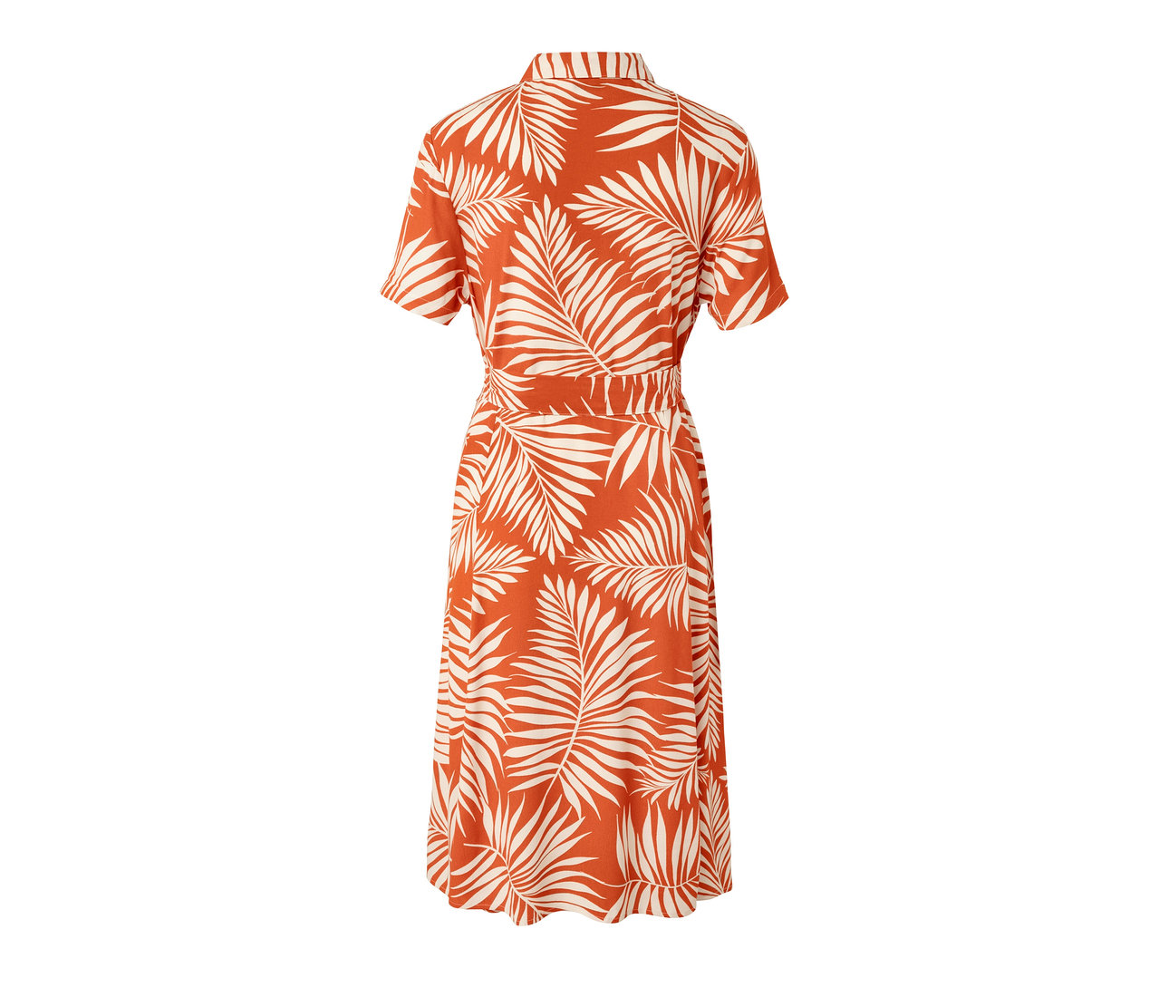 Detalem wzorzystej sukienki koszulowej z motywem liści.