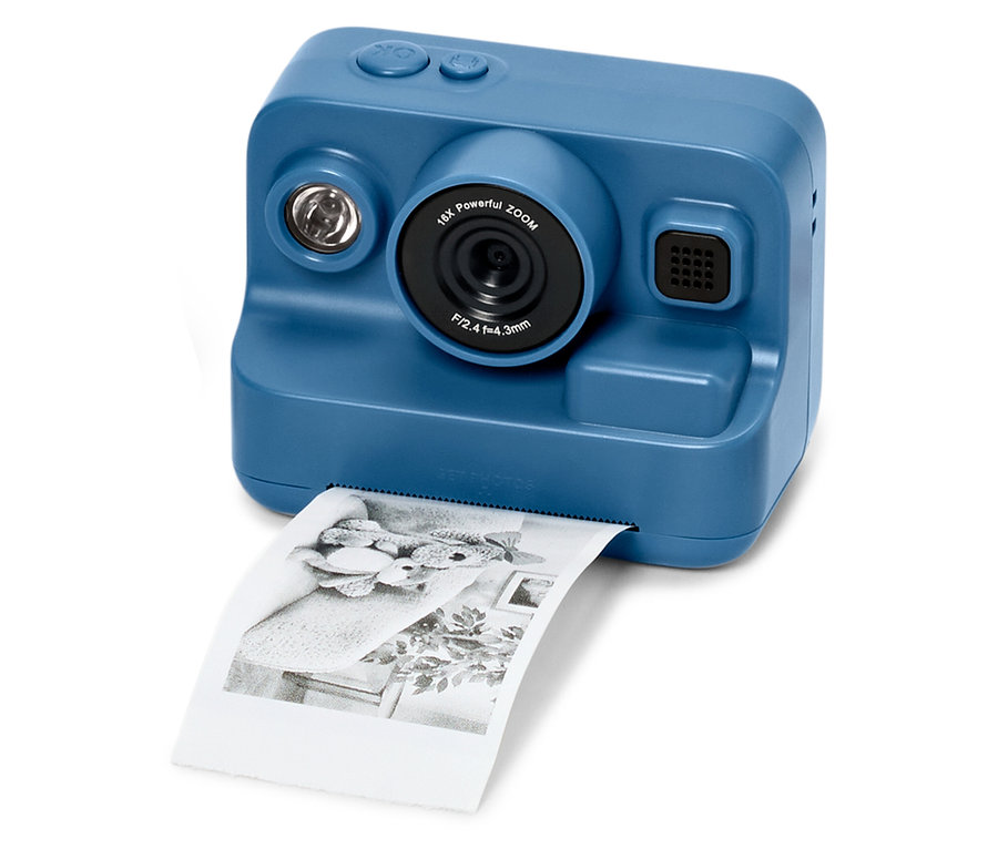 Niebieski aparat fotograficzny z drukarką drukujący zdjęcie.