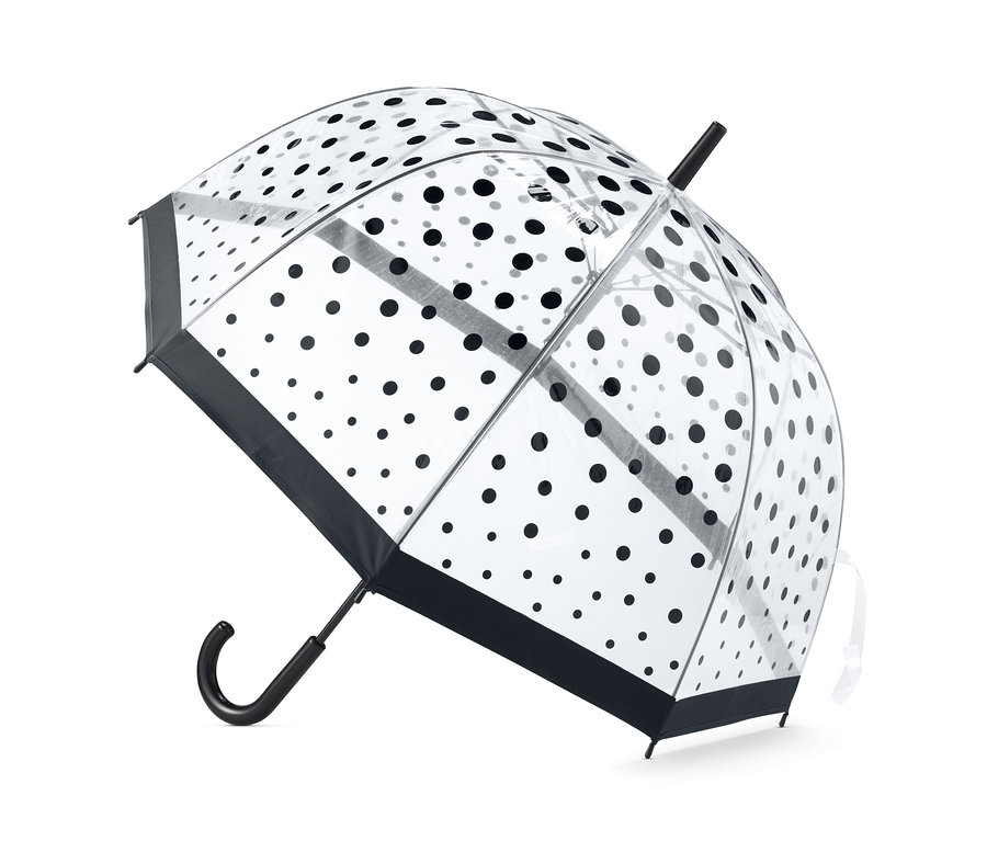 Przezroczysty parasol w czarne kropki.