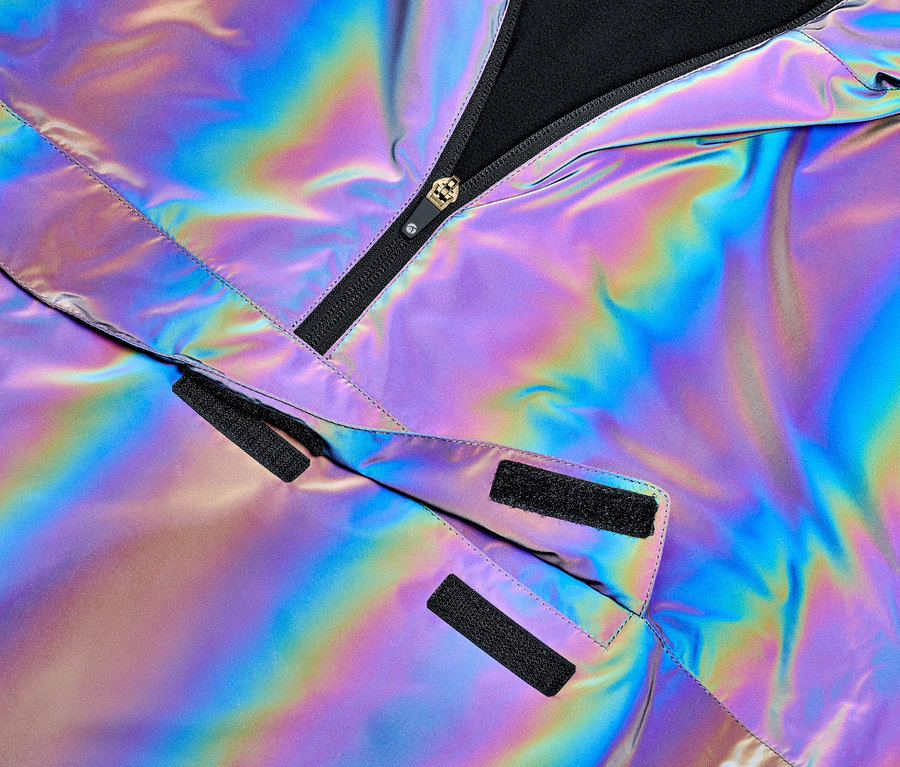 Zbliżenie na kurtkę wiartówkę Rainbow Reflective z czarnym zamkiem błyskawicznym i zapięciami na rzepy.
