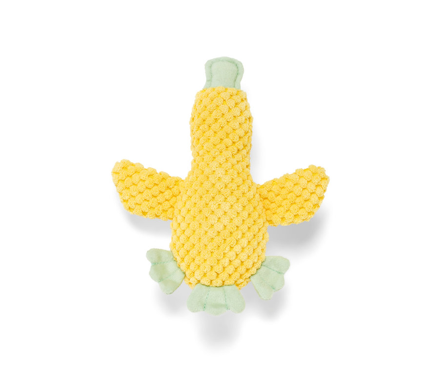 Żółta pluszowa zabawka dla psa „kaczątko” z jasnozielonymi detalami leży na białym tle.