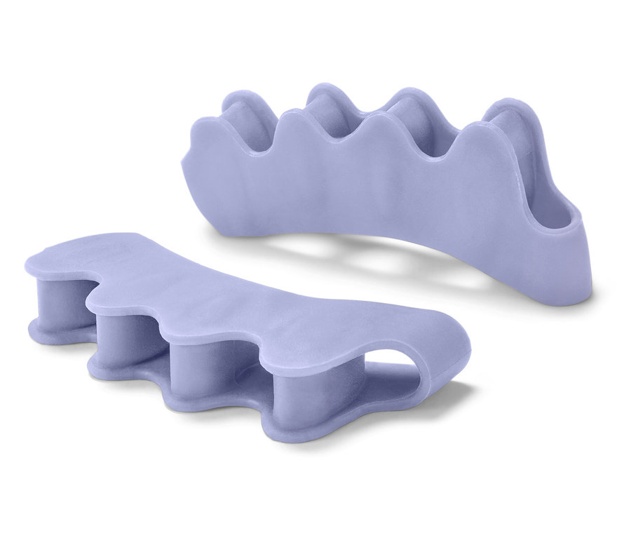 Dwa fioletowe separatory palców u stóp na białym tle.