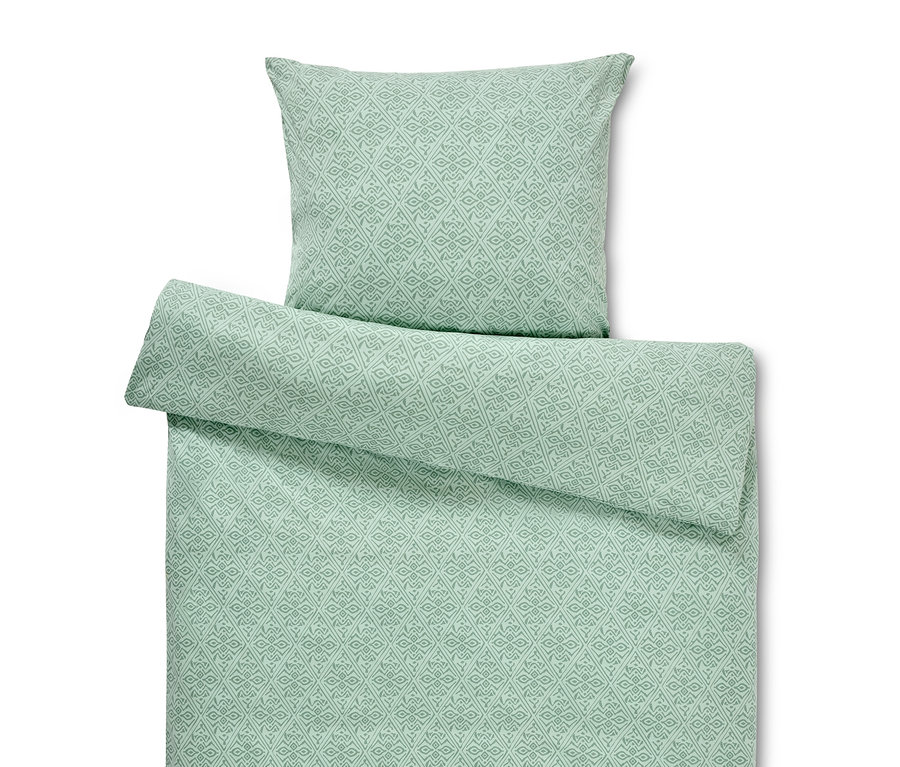 Zielona pościel dżersejowa w geometryczny wzór. Jeden standardowy i jeden ponadwymiarowy pokrowiec.