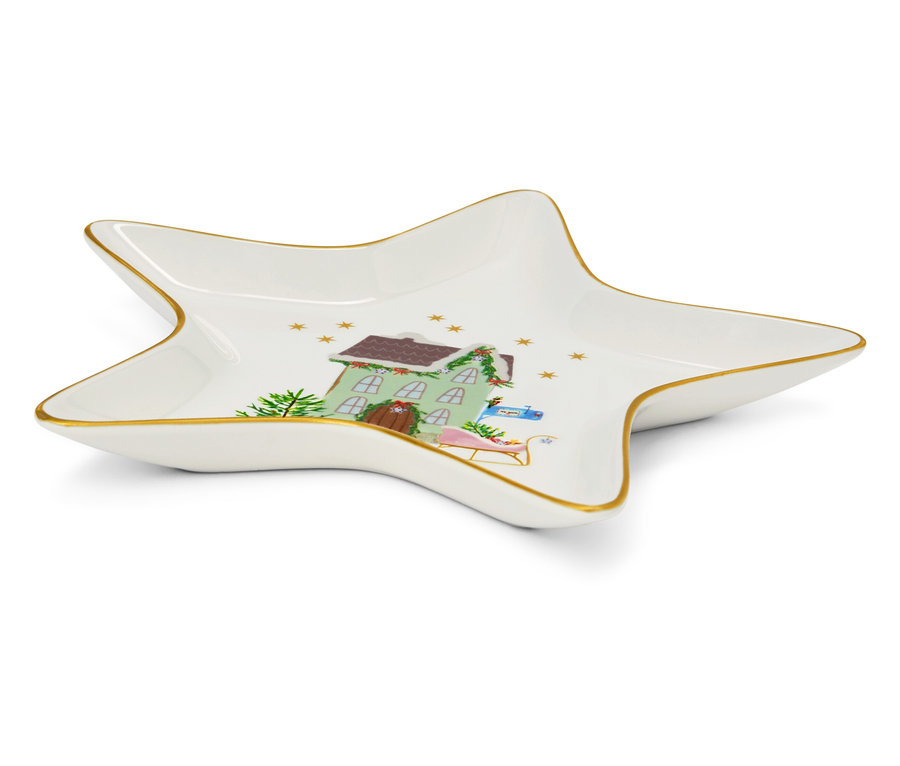 Ozdobna miseczka w kształcie gwiazdy z motywem świątecznym chaty, drzewka i sanek.