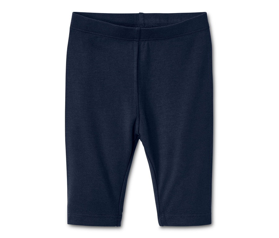 Niebieskie legginsy.