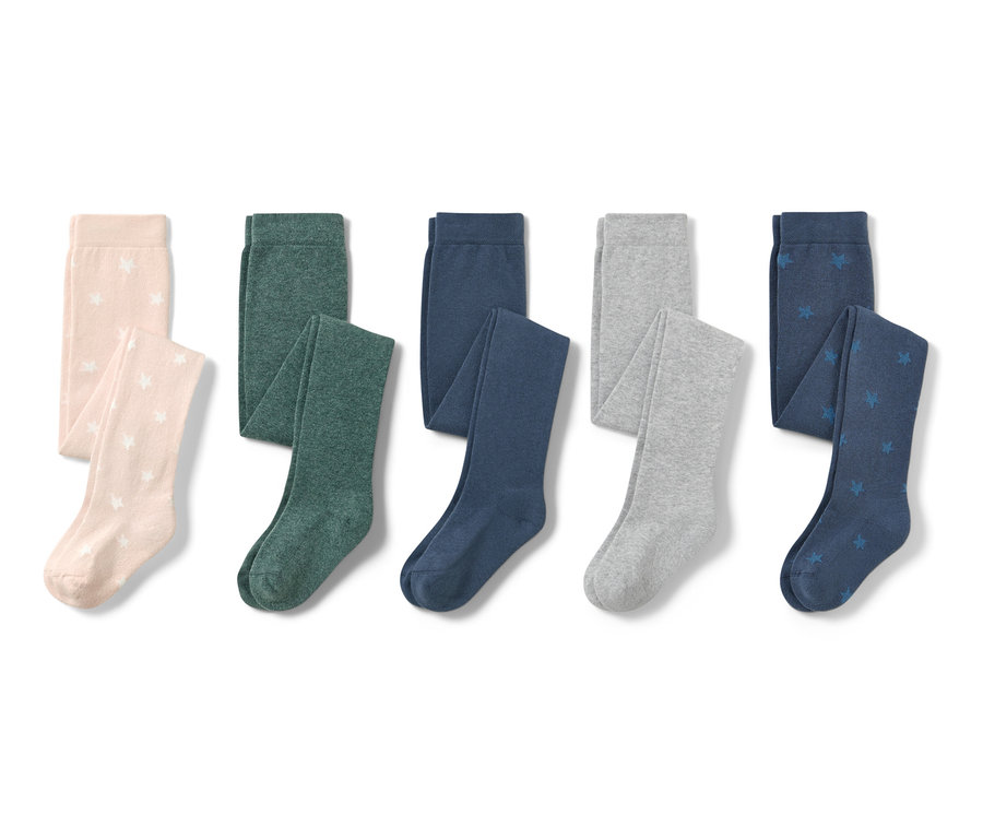 Pięć par bawełnianych rajstop w gwiazdki w kolorach beżowym, zielonym, granatowym, szarym i niebieskim.