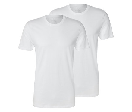 Dwa białe T-shirty leżą jeden na drugim, przy czym przedni T-shirt jest lekko przesunięty.