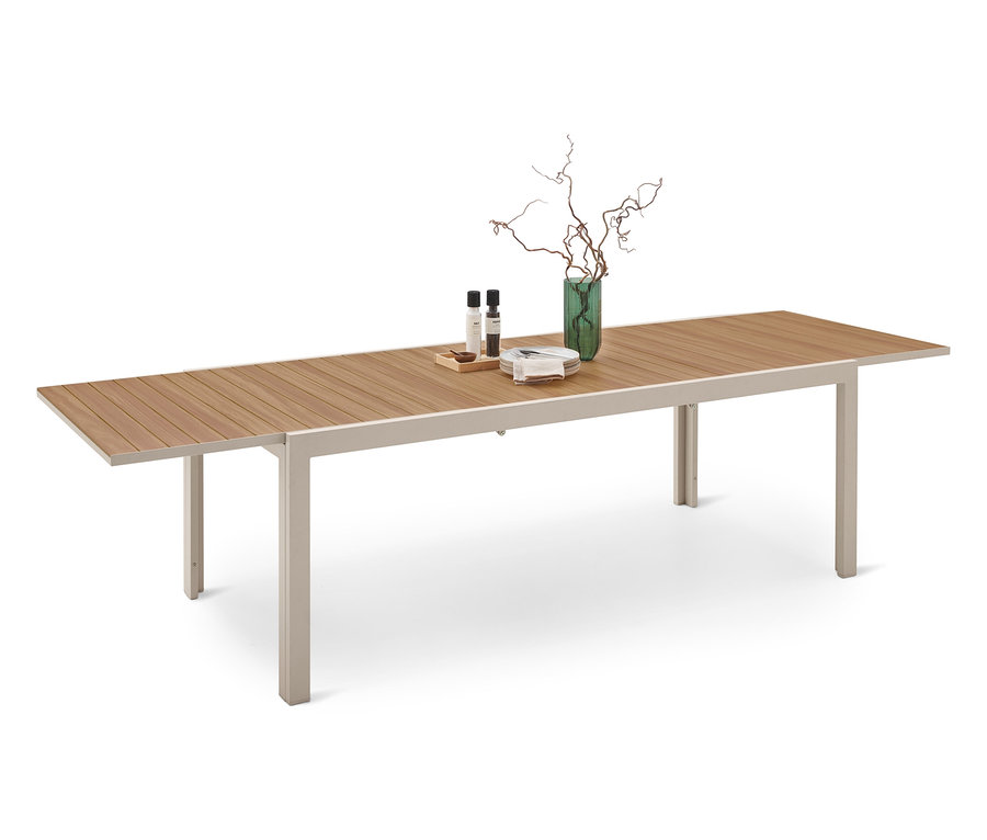 Stół z drewnianym blatem, jasnoszarą ramą i dekoracjami stołu z wazonem i przyprawami.