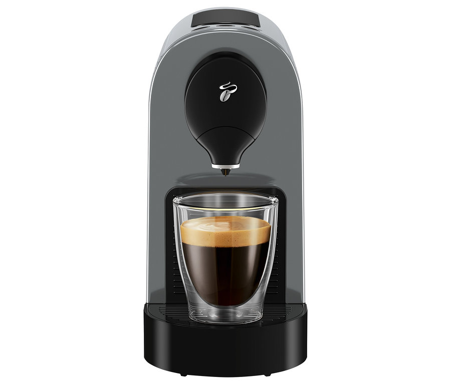 Szary ekspres do kawy Cafissimo pure+ z filiżanką kawy.