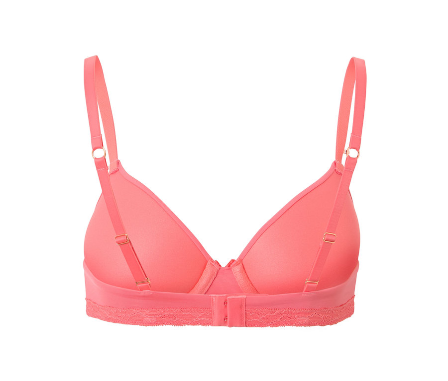 Zbliżenie biustonosza typu T-shirt w kolorze papai z regulowanymi ramiączkami i zapięciem z tyłu.