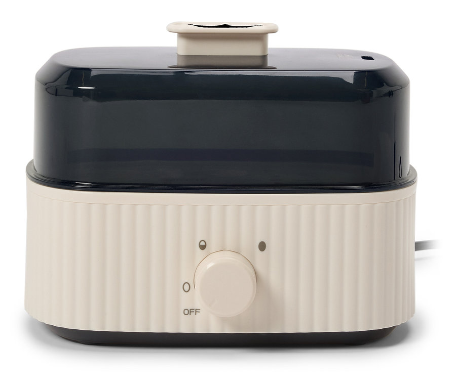 Biały parowar z czarnym, przezroczystym pojemnikiem i pokrętłem.