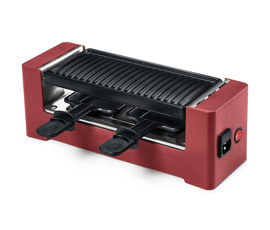 Czerwony grill do raclette dla 2 osób z powłoką zapobiegającą przywieraniu i dwoma patelniami.