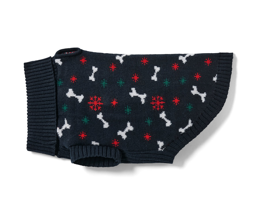 Granatowy sweter dla psa we wzór kości i płatków śniegu.