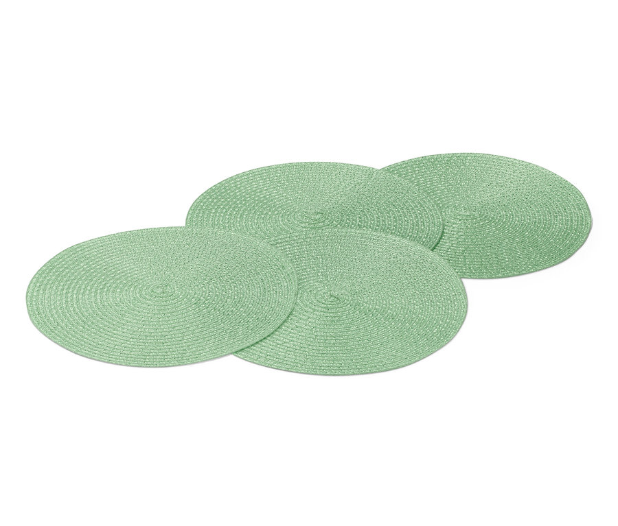 Cztery zielone podkładki pod talerze.