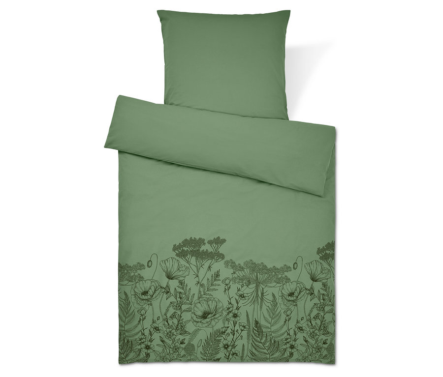 Zielona pościel z kwiatowym wzorem. Poduszka na górze.
