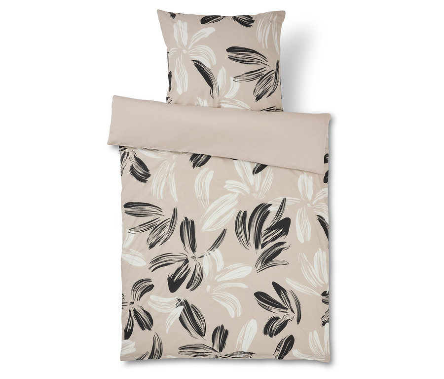 Pościel w kwiatowy wzór w kolorze beżowym i czarnym oraz pasująca poszewka na poduszkę.