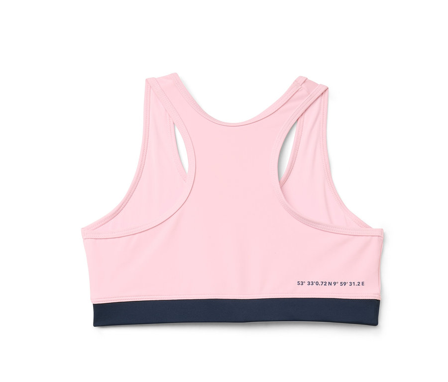 Szczegółowe ujęcie różowego zestawu bikini dla dzieci z granatowym obszyciem, widok z tyłu.