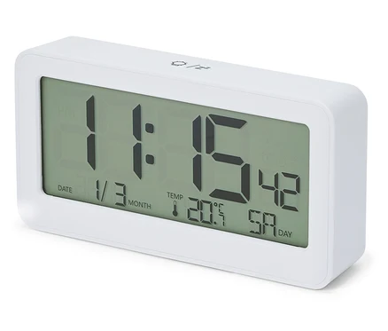 Biały radiobudzik LCD z cyfrowym wyświetlaczem pokazującym godzinę 11:15, datę 1/3 i temperaturę 20,5°C.