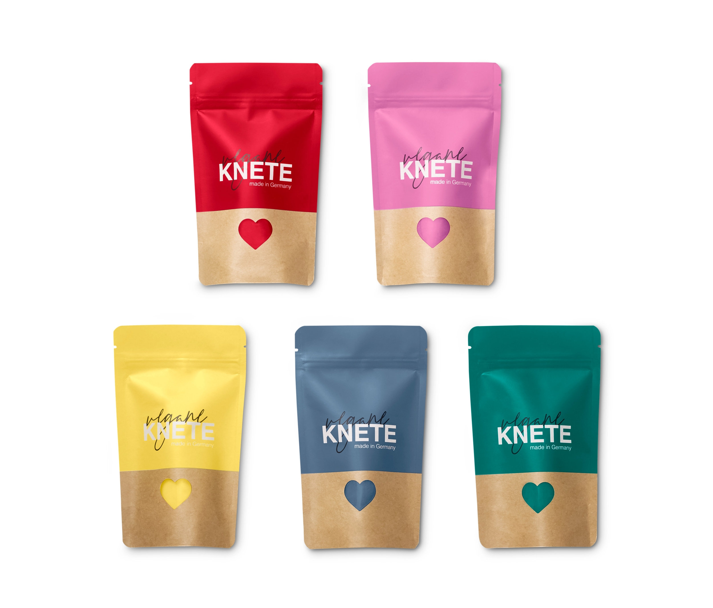 Pięć opakowań wegańskiej plasteliny w kolorach: czerwonym, różowym, żółtym, niebieskim i zielonym.